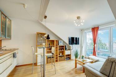 Bright attic apartment for rent in green residential area