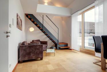 Modern, high-quality maisonette apartment with WiFi and balcony