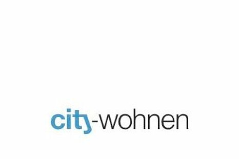 The photo shows the City-Wohnen Immobilien und Beratung logo