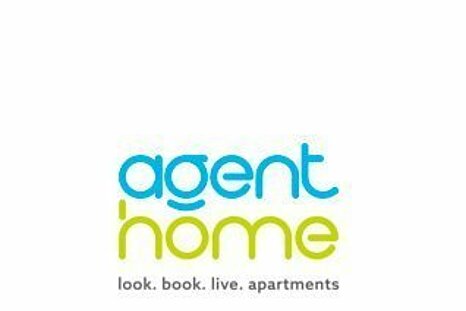 The photo shows the Agent Home Stuttgart logo