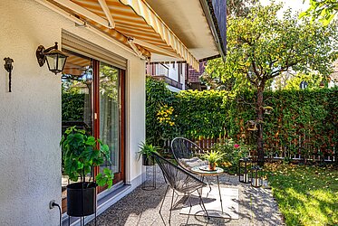Trudering-Riem: 3-room apartment with a garden, fireplace, and hobby room—available