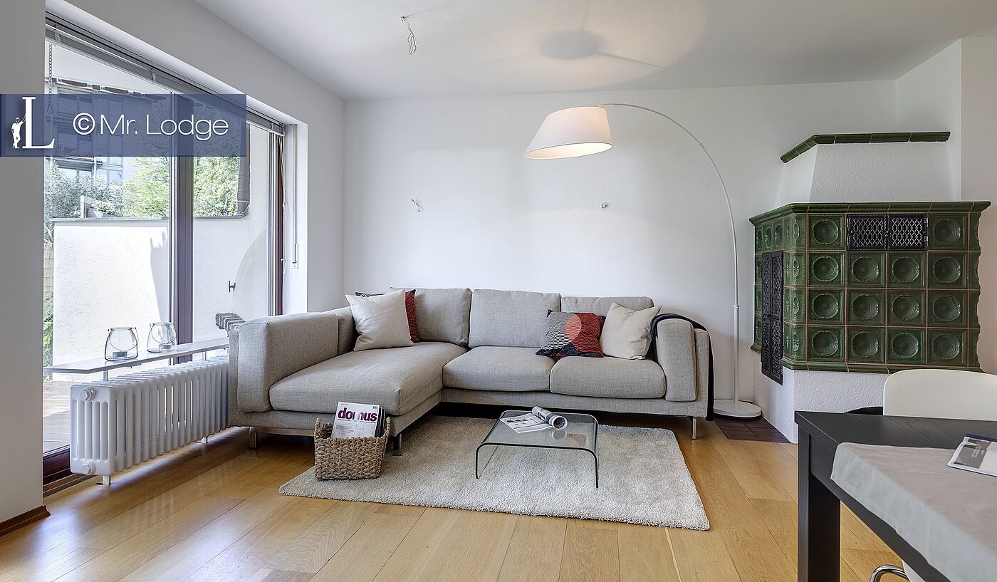 Ground floor apartment with 2 room | München-Harlaching | 1704ML6 | Wohnzimmer mit Kachelofen