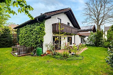 Neubiberg: Charming single-family home with a Mediterranean feel and a sunny garden
