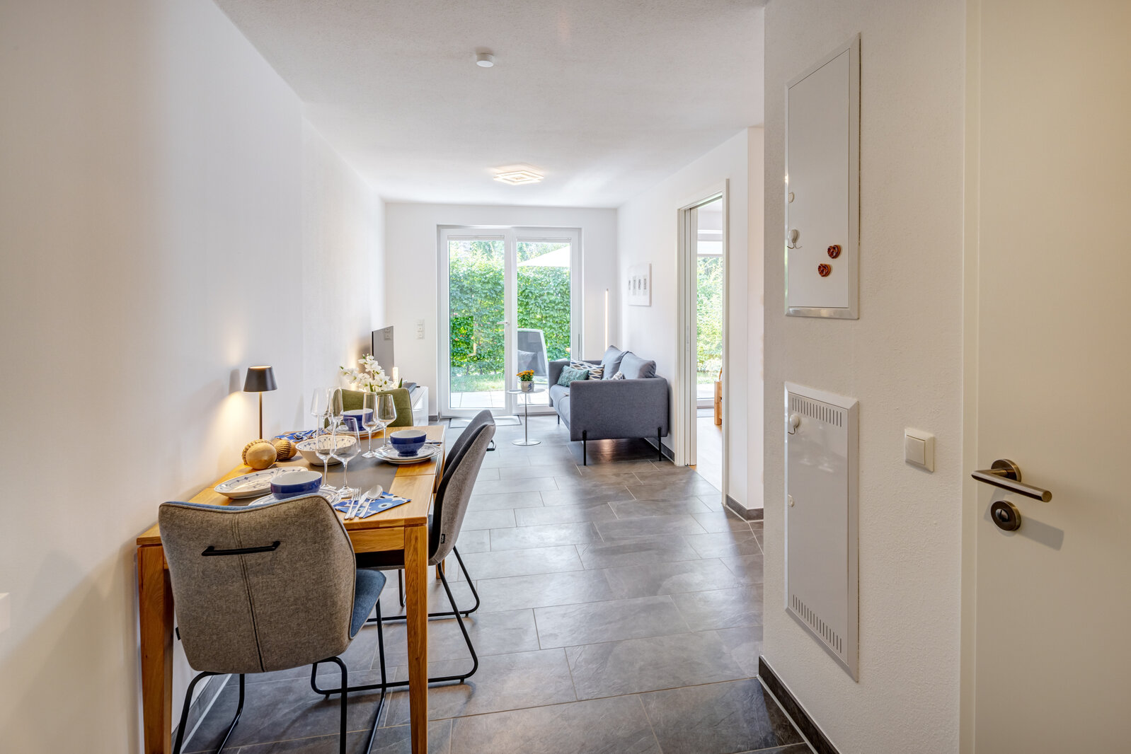 Moderne Neubauwohnung mit sonniger Terrasse und Garten - Foto 4