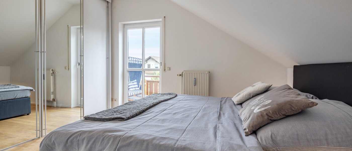 attic apartment München Denning 01 sleeping area 10809