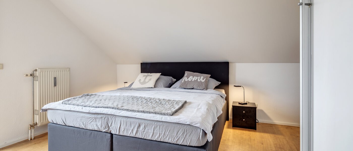 attic apartment München Denning 02 sleeping area 10809