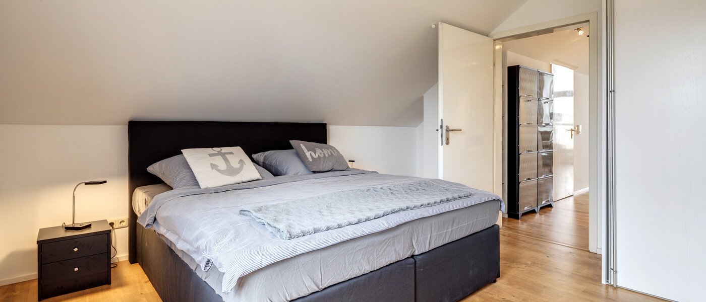 attic apartment München Denning 03 sleeping area 10809