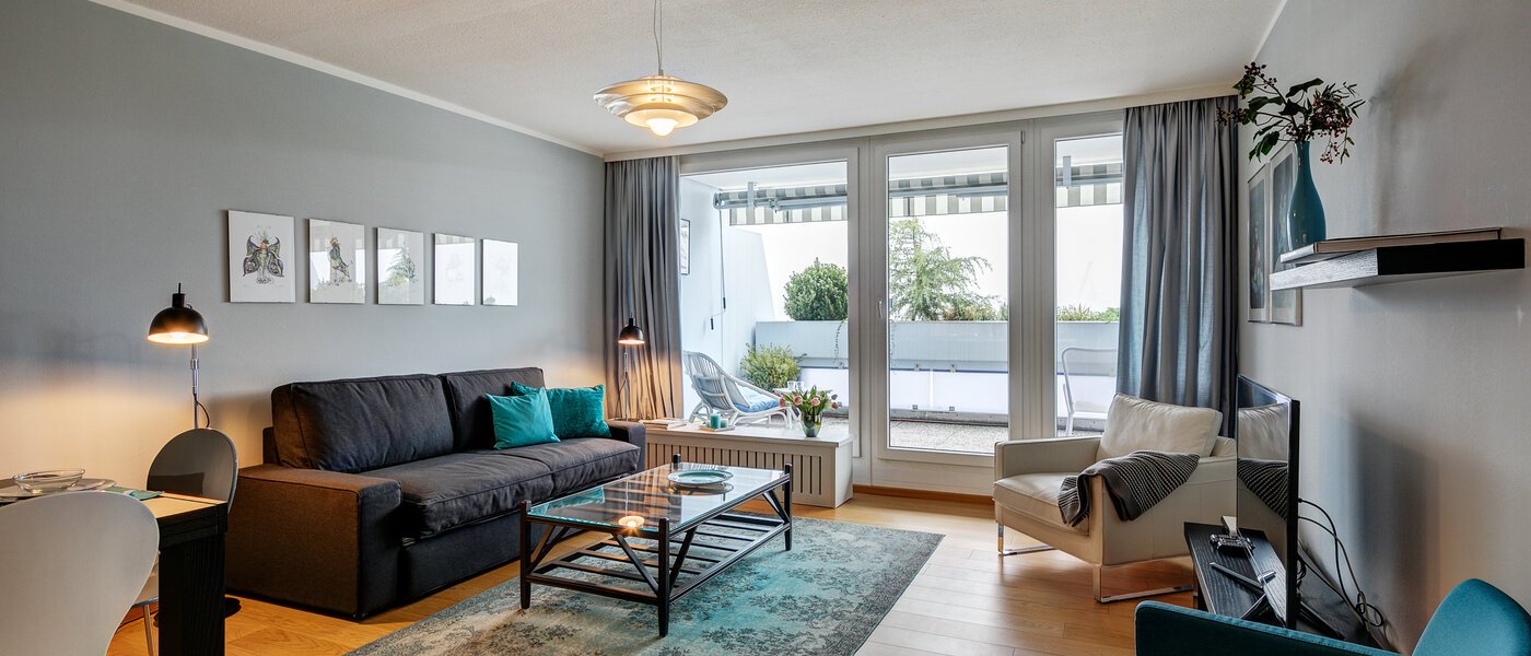 apartment München Olympiadorf 01 living room 7900