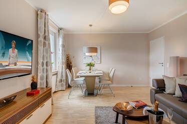 Modernly furnished apartment with balcony and internet
