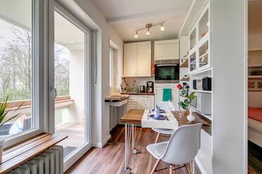Modern apartment with small workspace