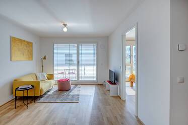 Bright apartment with balcony and designer furniture