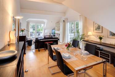 Large, sunny attic apartment with two balconies
