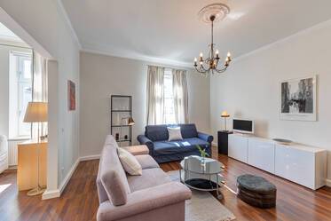 Historic apartment for rent with high ceilings & stucco