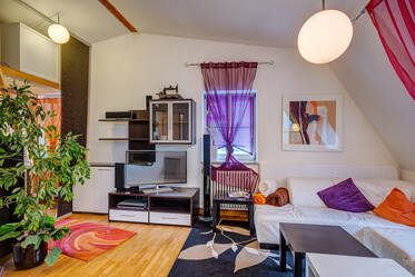 Attic apartment with view of the inner courtyard