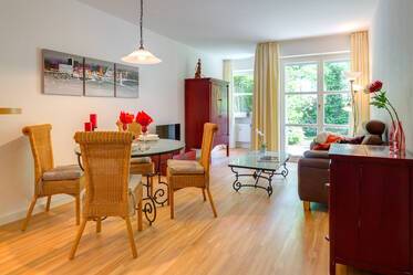 Furnished 2-room apartment with garden
