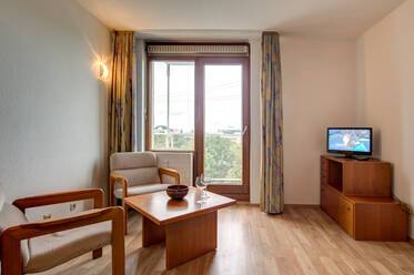 Furnished apartment with balcony, internet, and parking space
