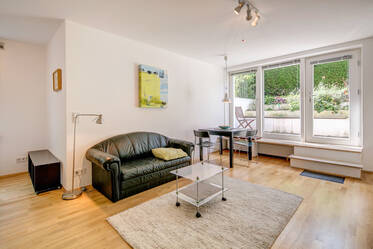 Modern souterrain apartment with garden view