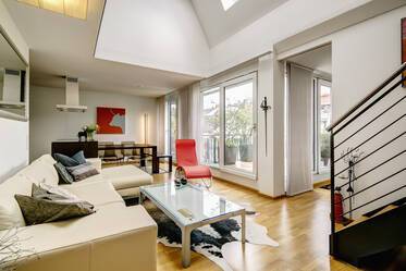 Luxuriously furnished maisonette apartment with roof-terrace