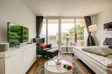 Modernly furnished apartment with balcony