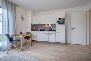 Top location right by Riemer Park: Modern and bright apartment with south-west terrace and garden