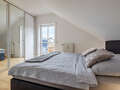 attic apartment München Denning 01 sleeping area 10809