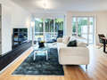 apartment with garden 	 München Denning 01 living area 14634