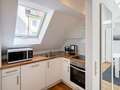 attic apartment München Schwabing 01 kitchen 5576