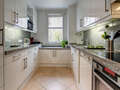 roof terrace apartment München Arabellapark 01 kitchen 9024