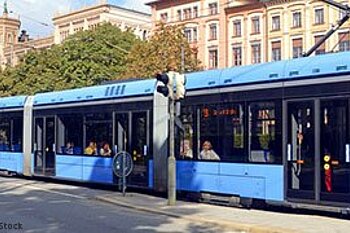 The photo shows a streetcar of the transportation service MVV