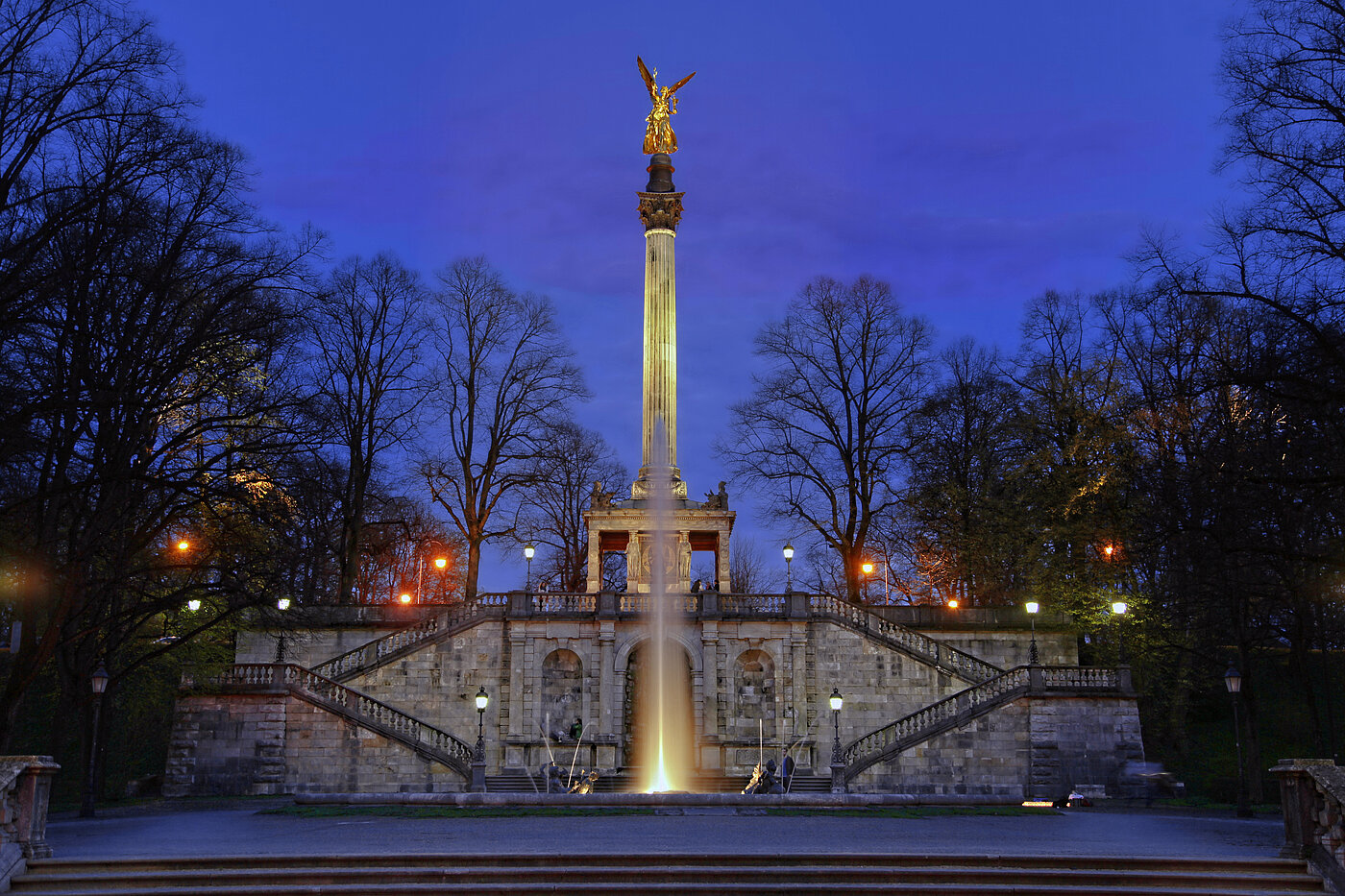 The photo shows the well-lit Angel of Peace by night