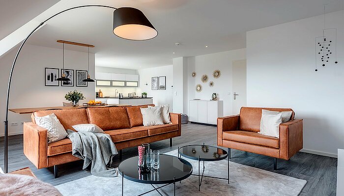 [Translate to english:] Eingerichtetes Wohnzimmer